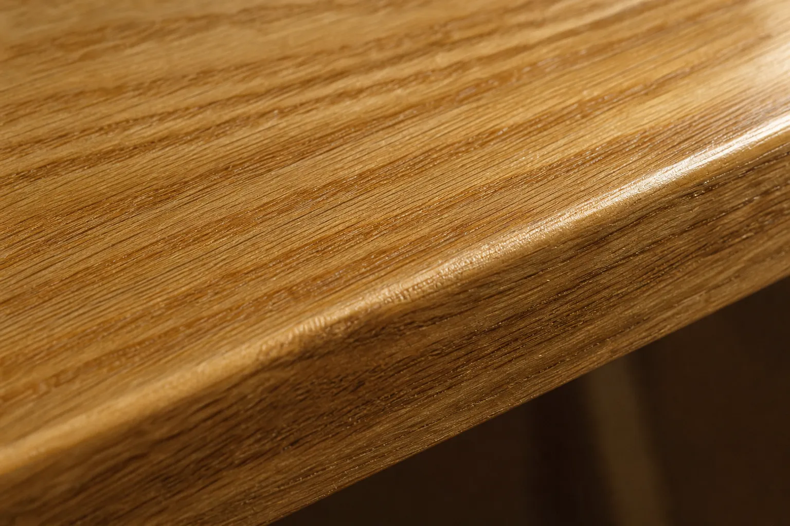 Oiled solid wood surface in close detail.